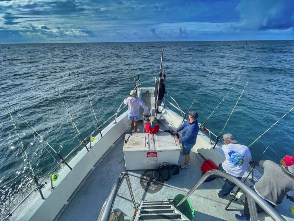 Passengers riding on a charter boat